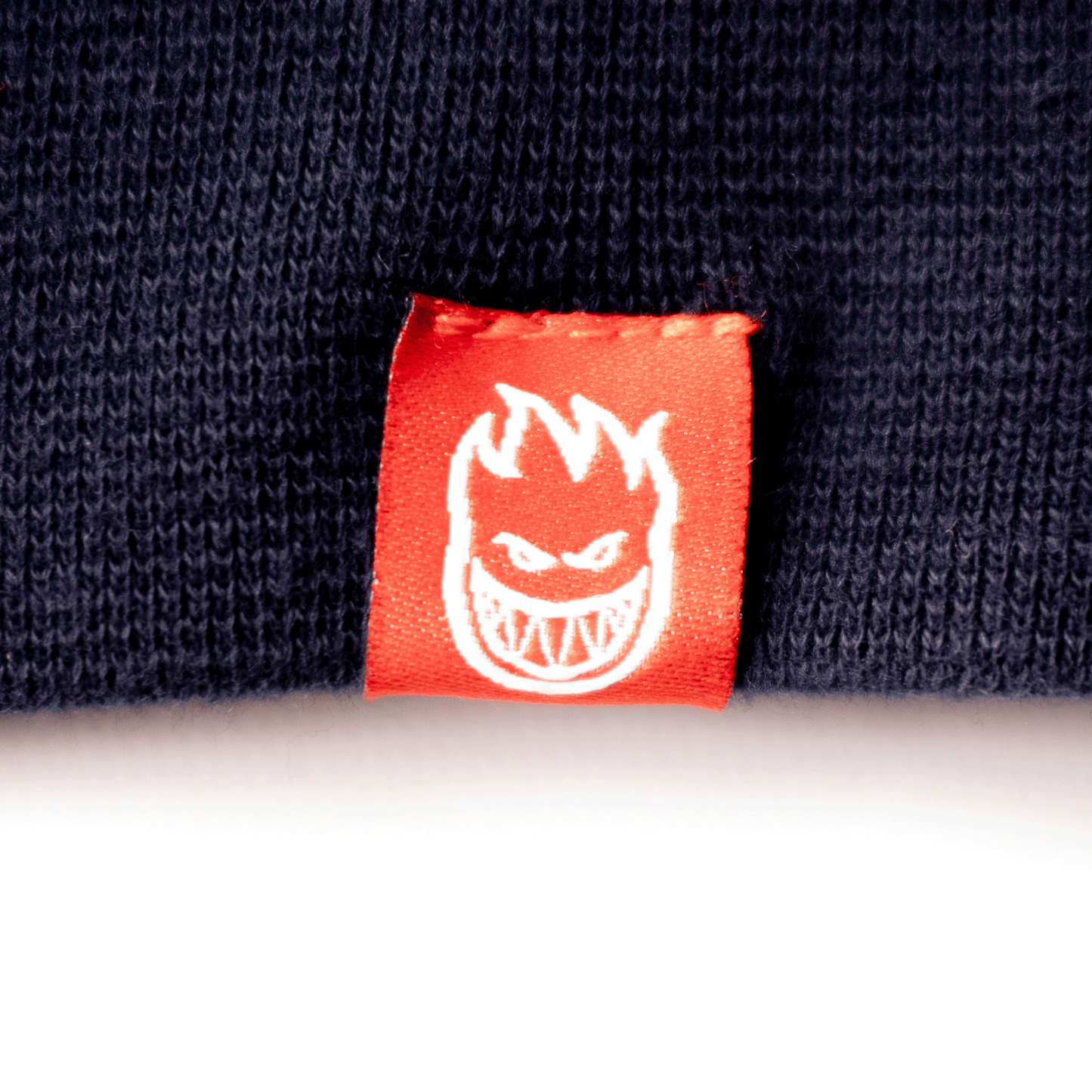 Spitfire(スピットファイアー)のアパレル Classic Swirl Overlay Pullover(Deep Navy)M/L/XLのタグ