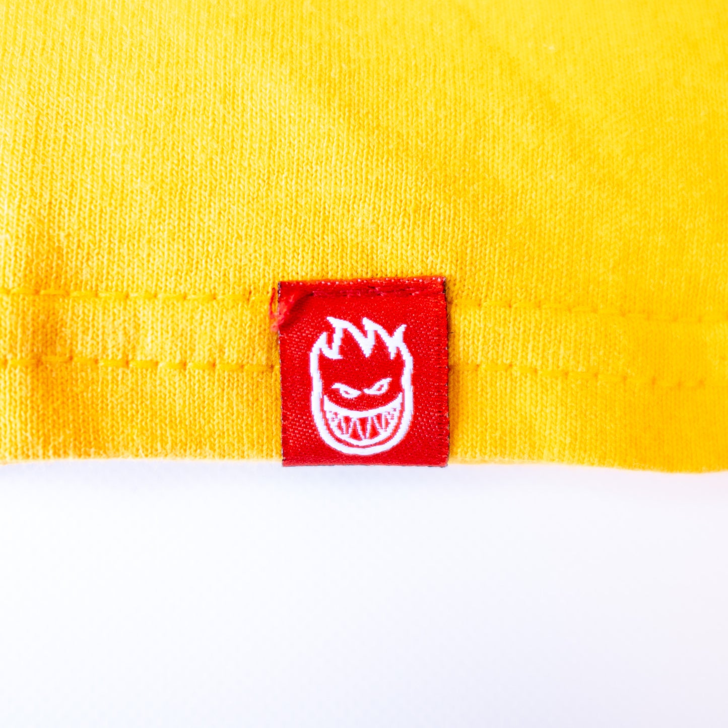 Spitfire(スピットファイアー)のアパレル YouthTEE(キッズサイズ) CLASSIC VORTEX(GOLD)YS/YM/YLのタグ